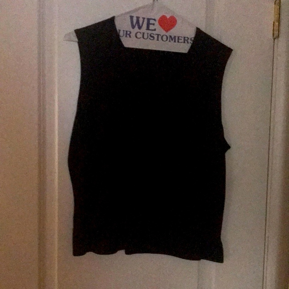 Black top with slits on the side.